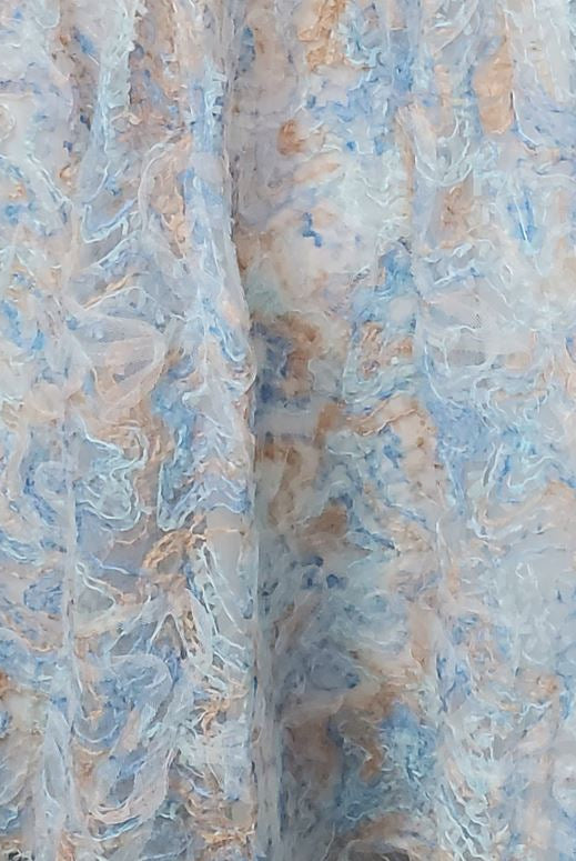 Blue and cream textured fabric