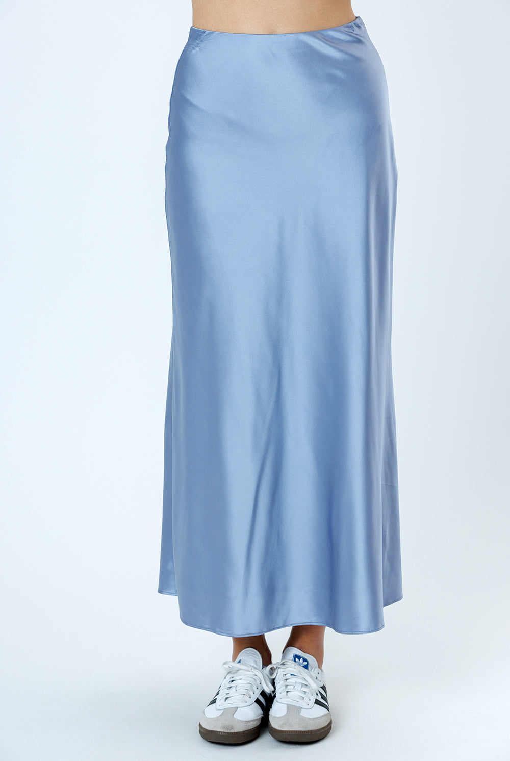 Light blue satin skirt on a white background