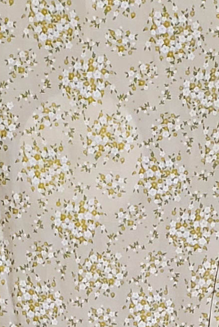 A light-colored dress with floral pattern