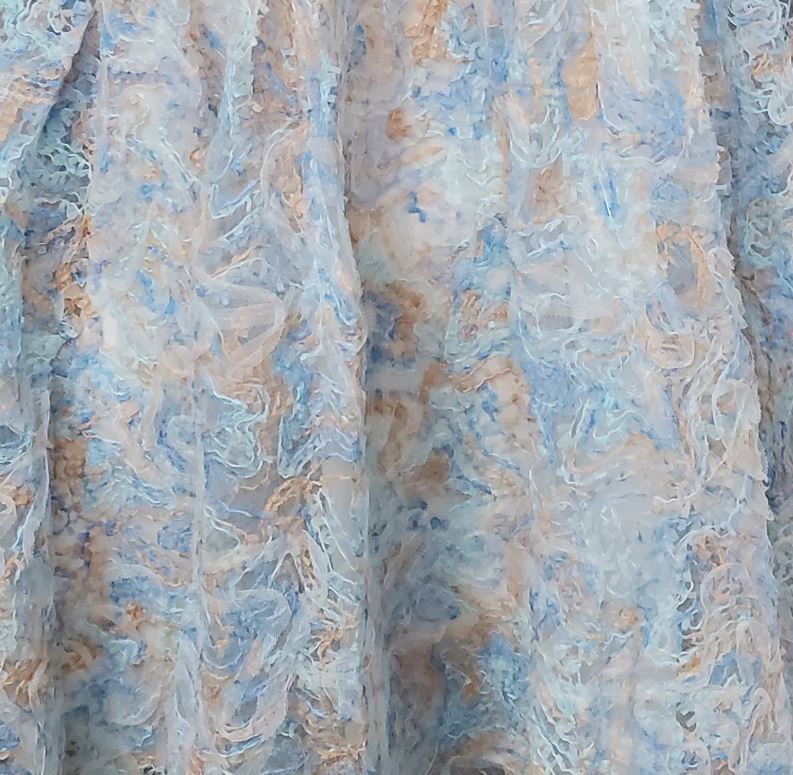 Blue and cream textured fabric