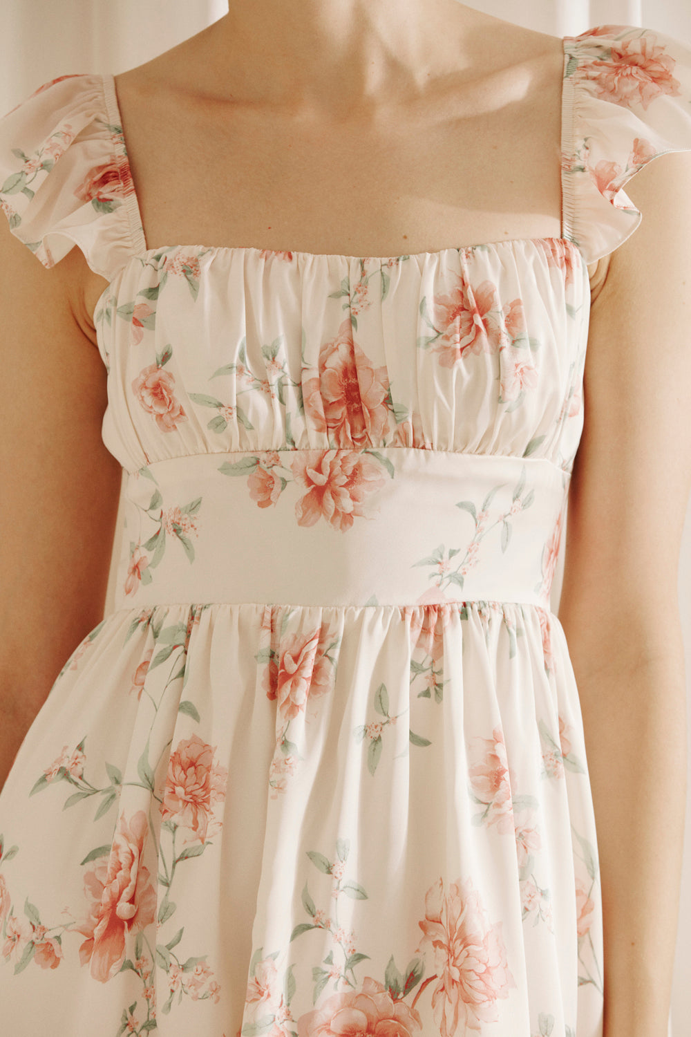Floral dress with a soft beige background