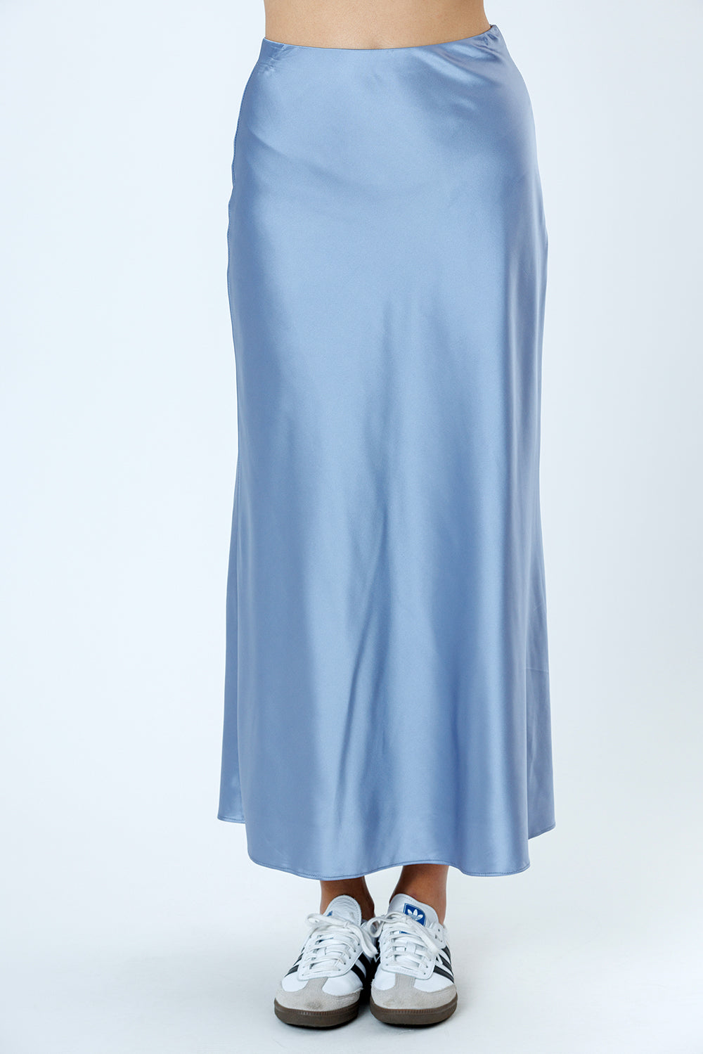Light blue satin skirt on a white background