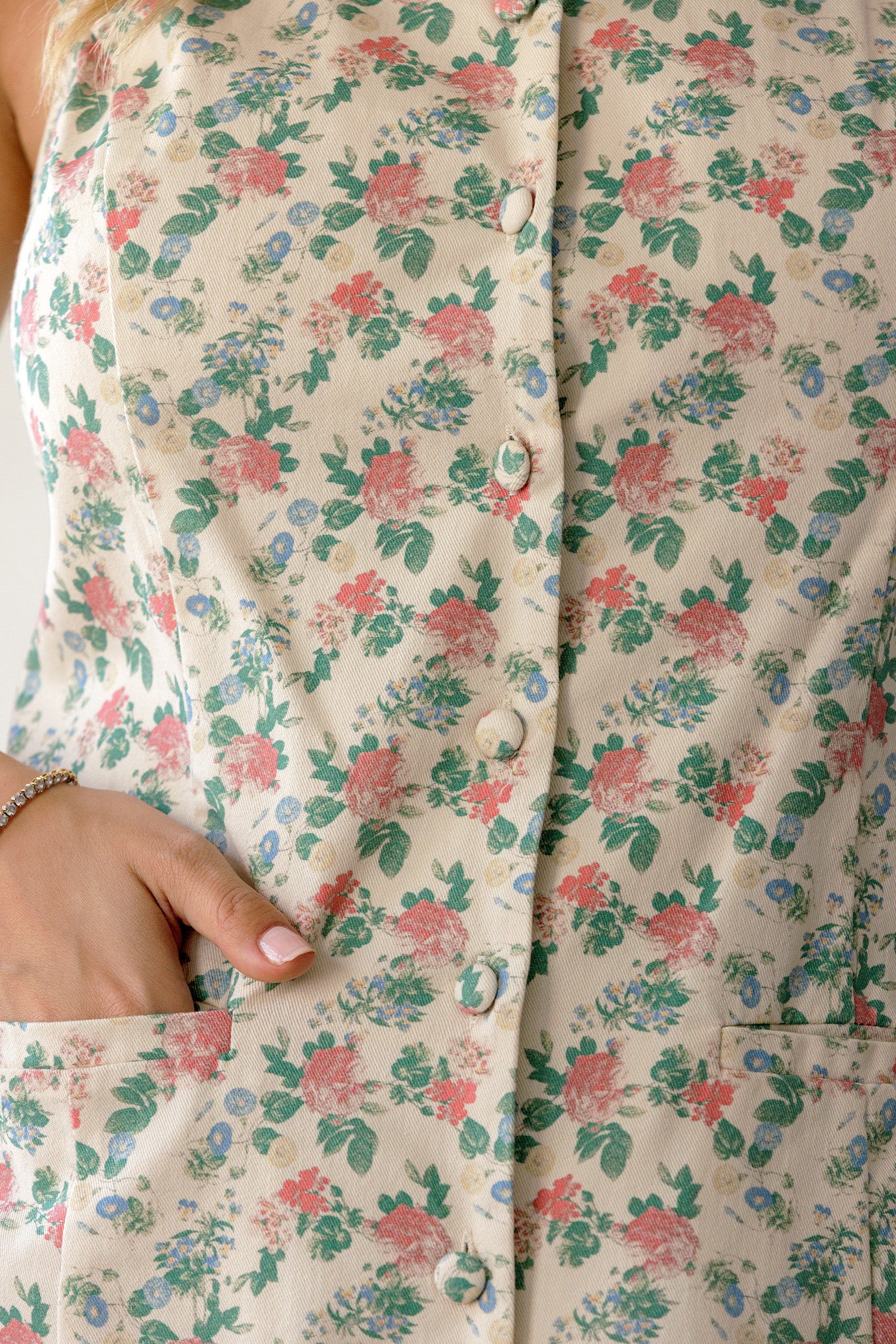 A romantic rose print and a timeless button-front design.