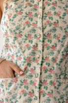 A romantic rose print and a timeless button-front design.