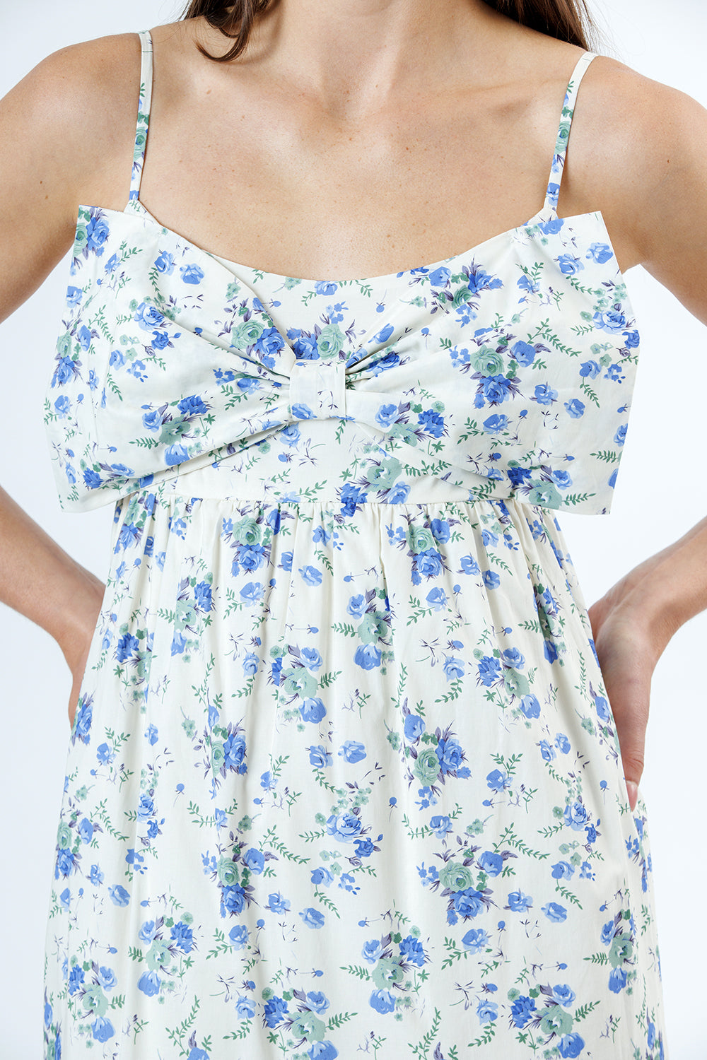 Floral dress with blue flowers on a white background