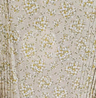 A light-colored dress with floral pattern