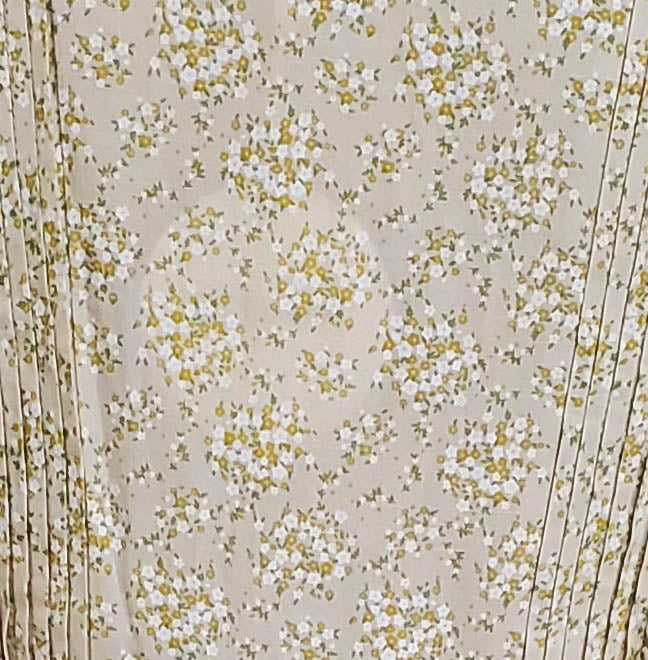 A light-colored dress with floral pattern